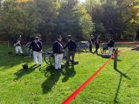 Image of war re-enactors at the War of 1812 event at Bradley Museum in Fall 2019.